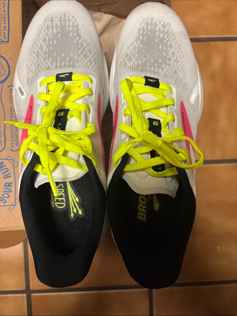 Brooks White Running Shoes with Neon Yellow Laces and Pink Accents